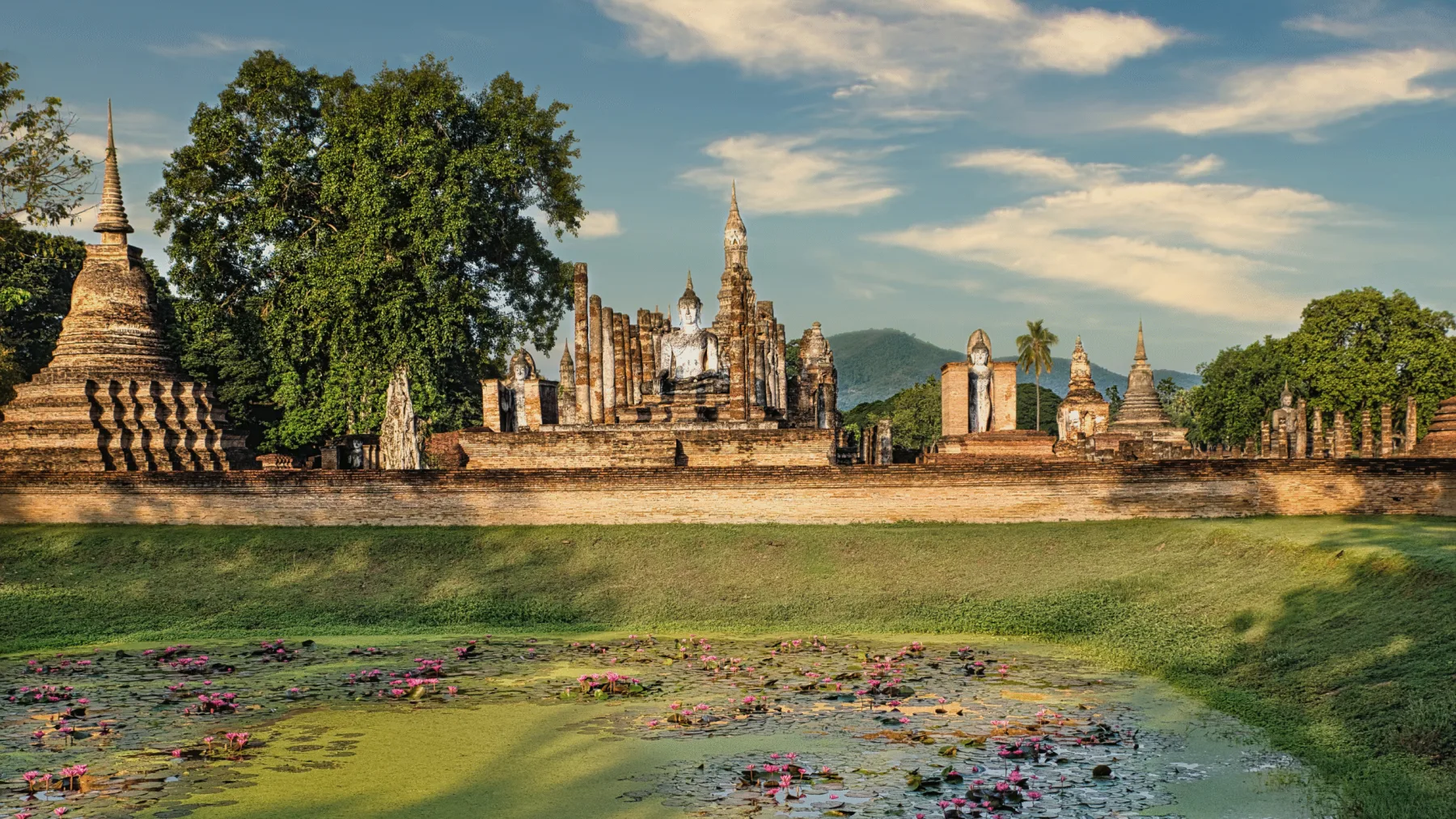 Historic Thai temple and lotus pond